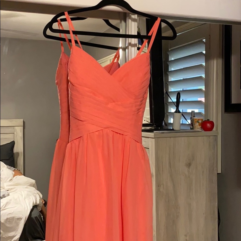 A coral Nora dress bought on Amazon